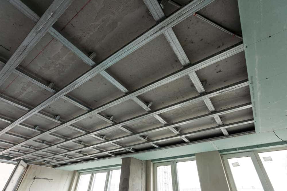 Stripped ceiling grid inside a commercial building
